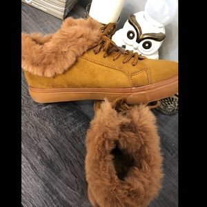 Sneakers with fur around the ankles